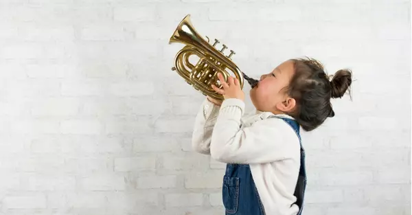 How Music Lessons Can Help Your Child's Development,