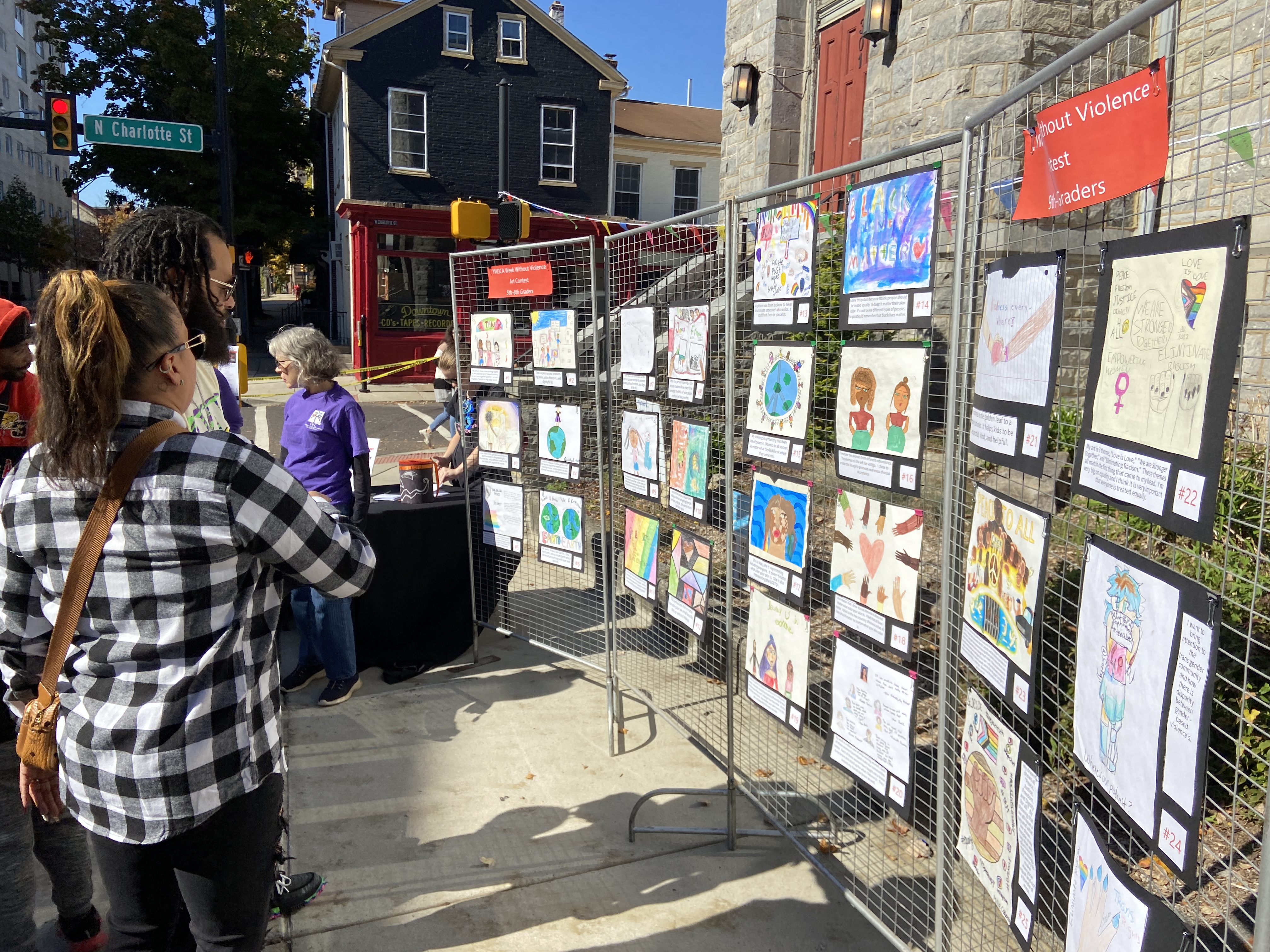 Visitors to the Week Without Violence event Saturday voted on the best student art in a contest meant to highlight the issues of violence and racism.(Evan Brandt -- MediaNews Group)