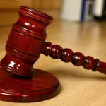 A red wood gavel