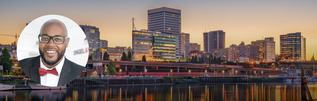 Josh Bellingers's headshot over a picture of the Tacoma, Washington skyline at dusk