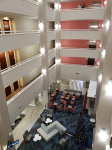 view inside hotel looking over the inside balconies to the lobby