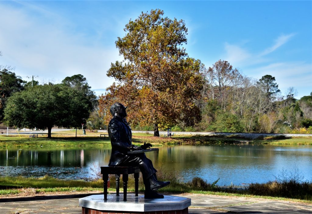 Park and lake in background, Ray Charles' statue in foreground