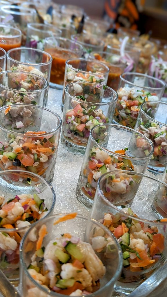 small glasses sitting on ice with ceviche