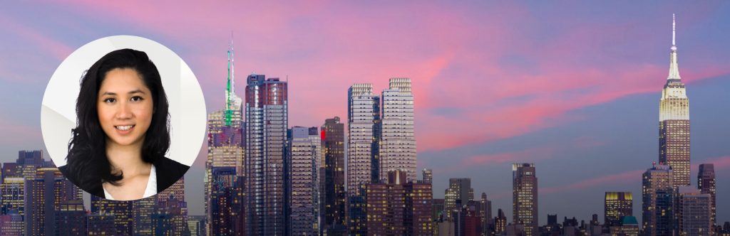 Headshot of Phylicia Rodriguez-Chiu over a picture of the New York City skyline at dusk