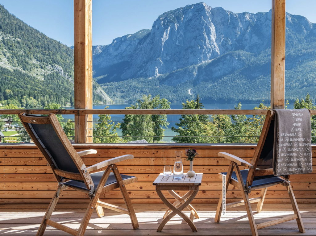 Sun chairs looking out to the lake and mountaintop surrounding the Mayrlife Health Resort in Altaussee, Austria.