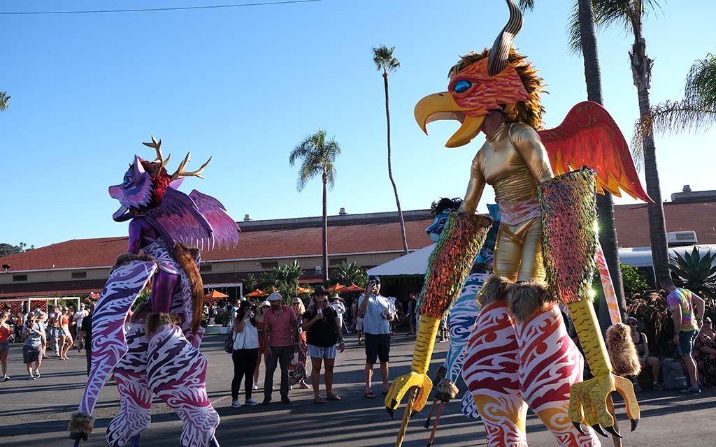 Entertainers in whimsical animal costumes on stilts wowed the attendees.