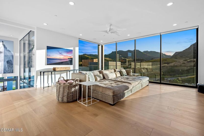 Media room with oversized windows