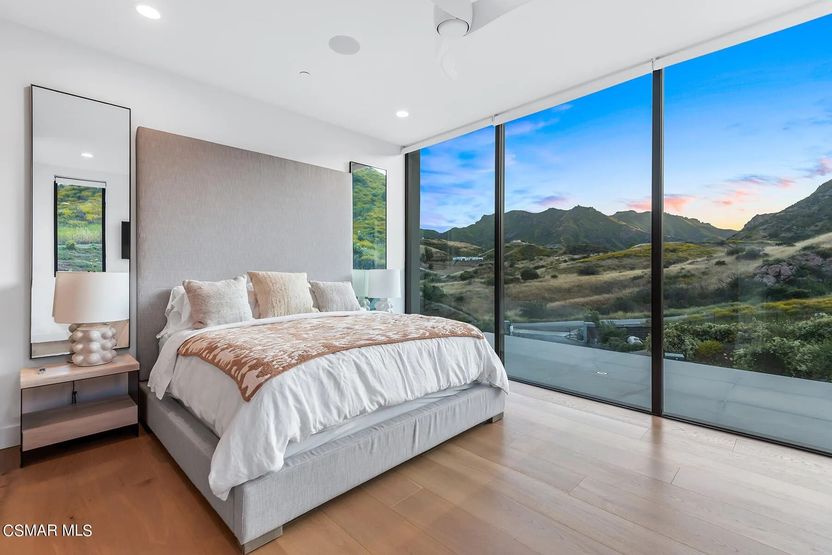 Bedroom with floor-to-ceiling windows