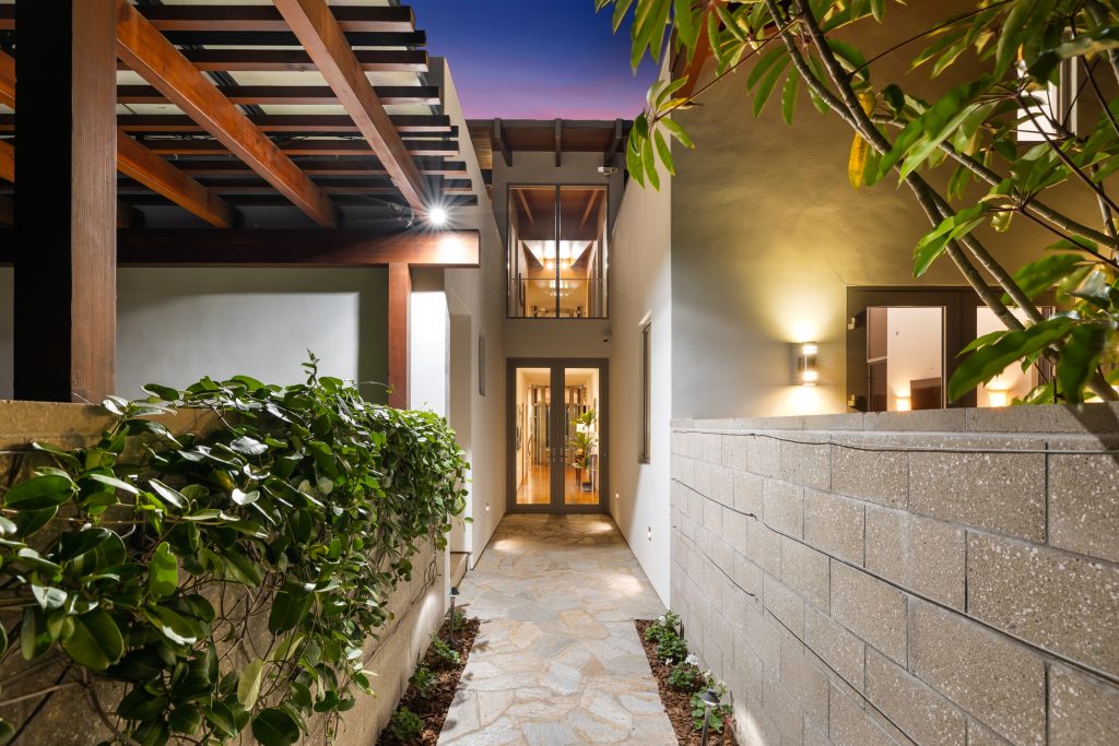 Luxurious walkway entrance with stunning ambiance in modern home.