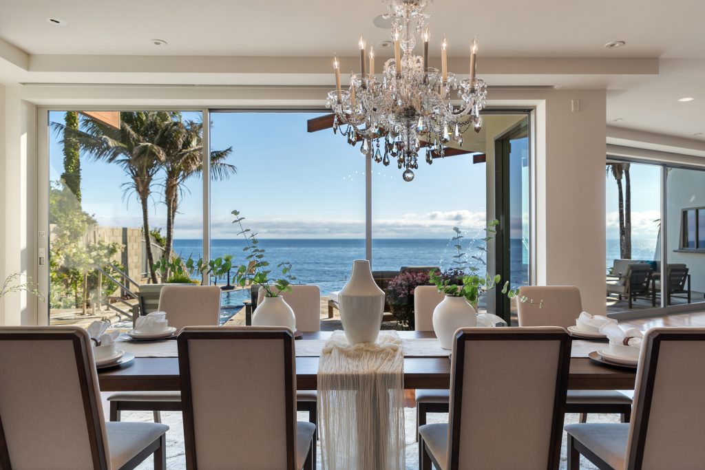 Views of the horizon from luxurious dining room table.