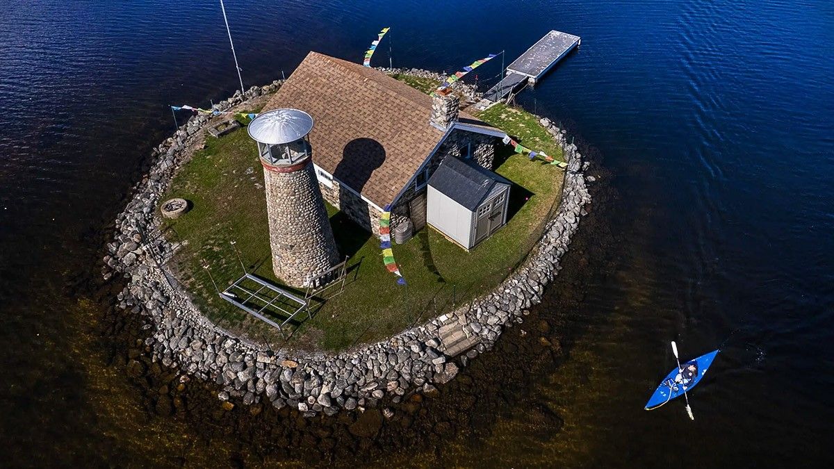 Rustic Retreat: A Maine Private Island with Lighthouse and Stone Cottage Reels in a Buyer