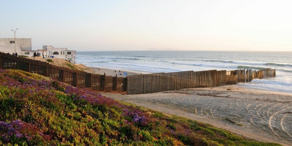 Tijuana Slough National Wildlife Refuge Beach in Imperial Beach with the Border to Mexico during sunset