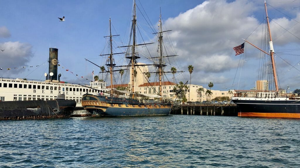 View from the water at various ships at the Maritime Museum San Diego