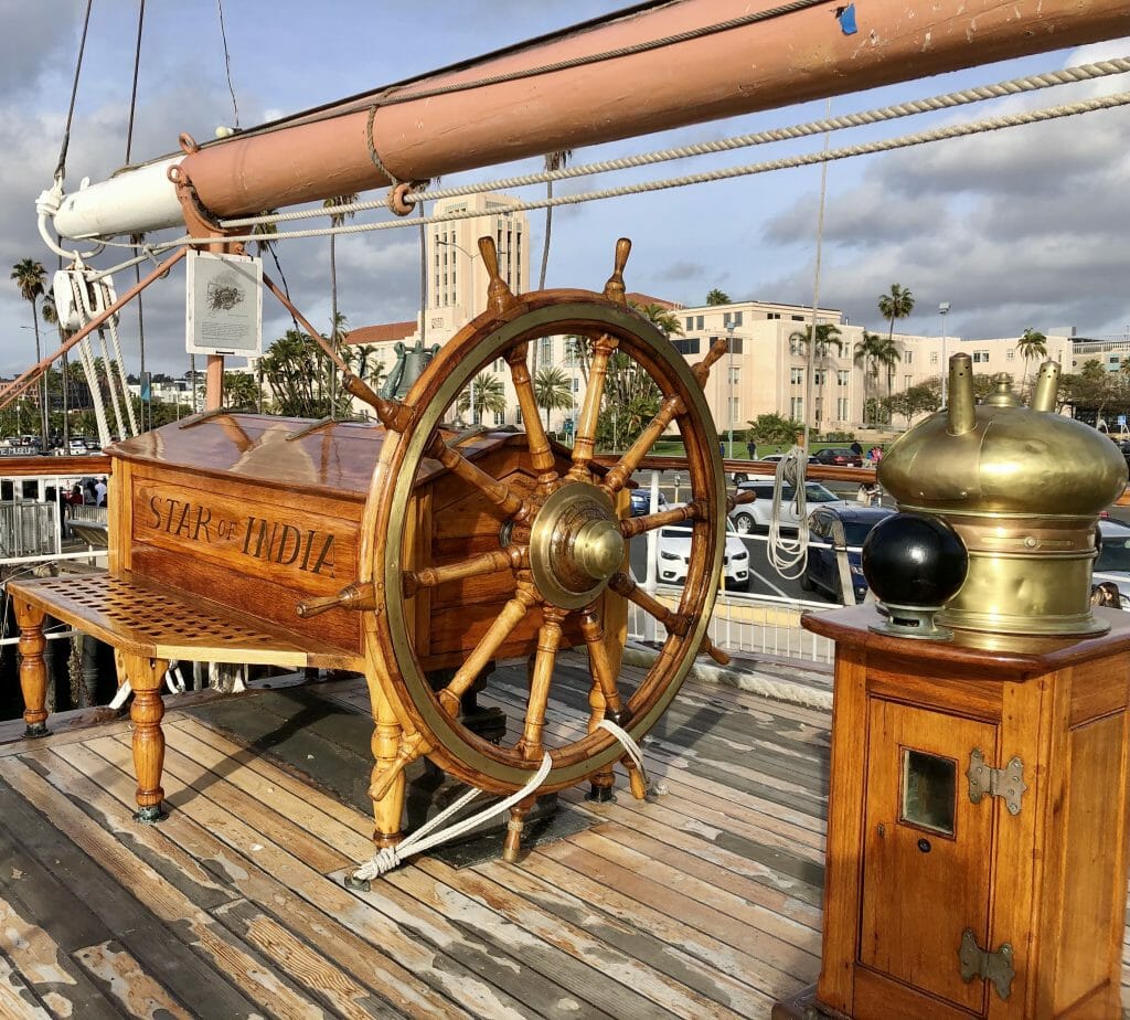 wood helm on board of historic sail boat Star of India San Diego