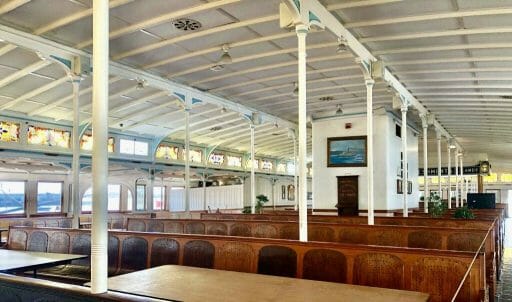 Wooden benches and tables on board the Berkeley Ferry at the San Diego Maritime Museum