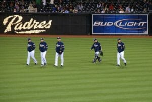 5 padres players walking over the field at Petco Park