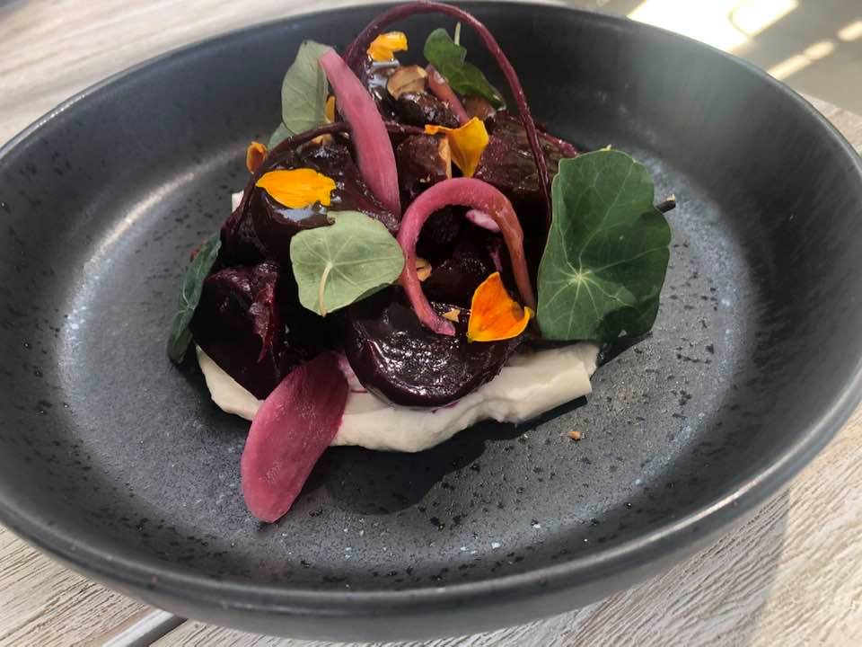 Beet Salad on a matt dark grey plate at Small Barn Temecula