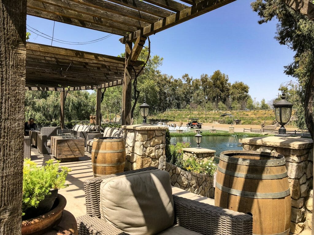 covered landscaped seating area at Vitagliano winery Temecula - Things to do in Temecula