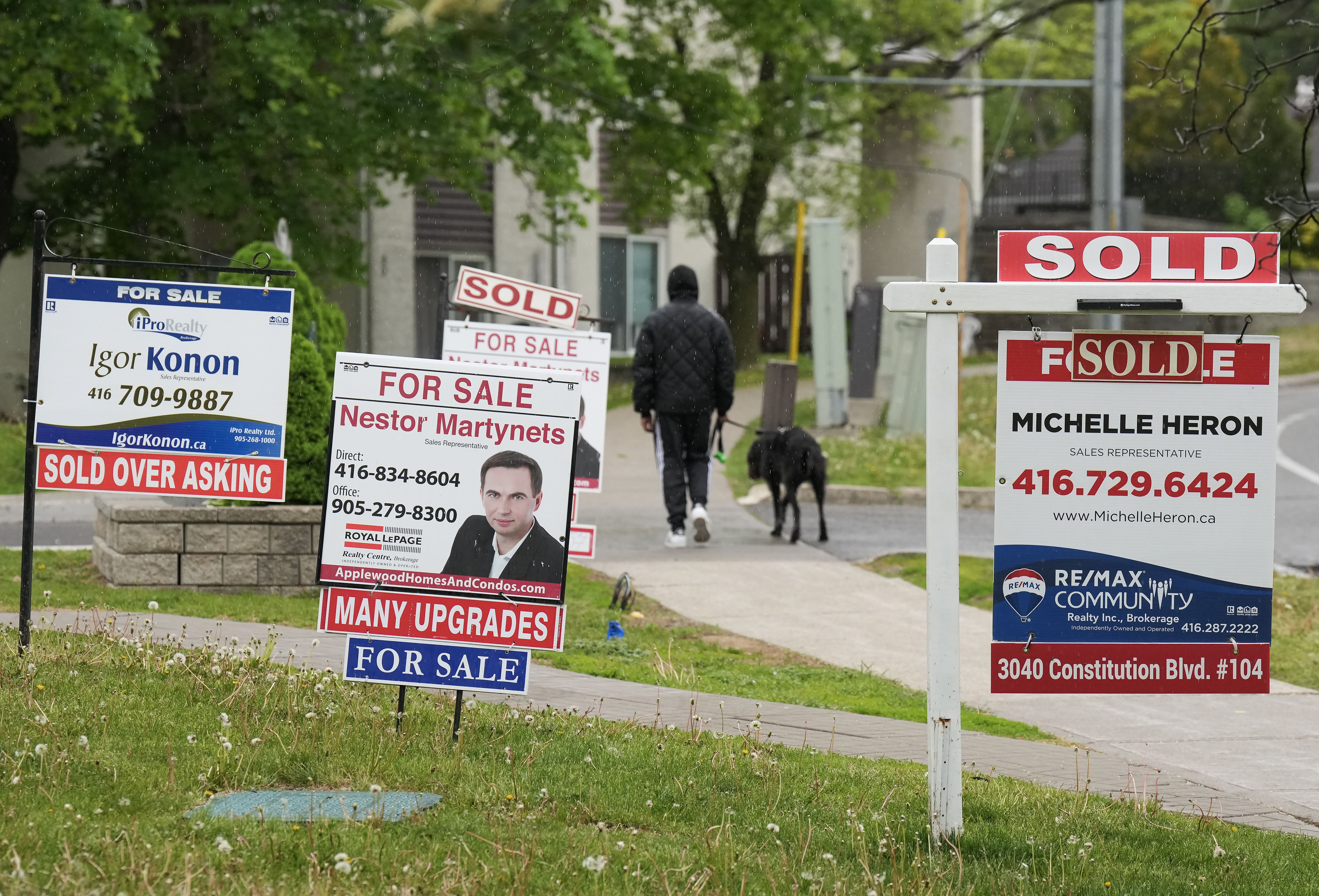 Multiple for-sale and sold real estate signs in Mississauga, Ont., on May 24. Changing conditions have brought supply and demand back into balance after tightening surprisingly quickly in the spring, say experts.