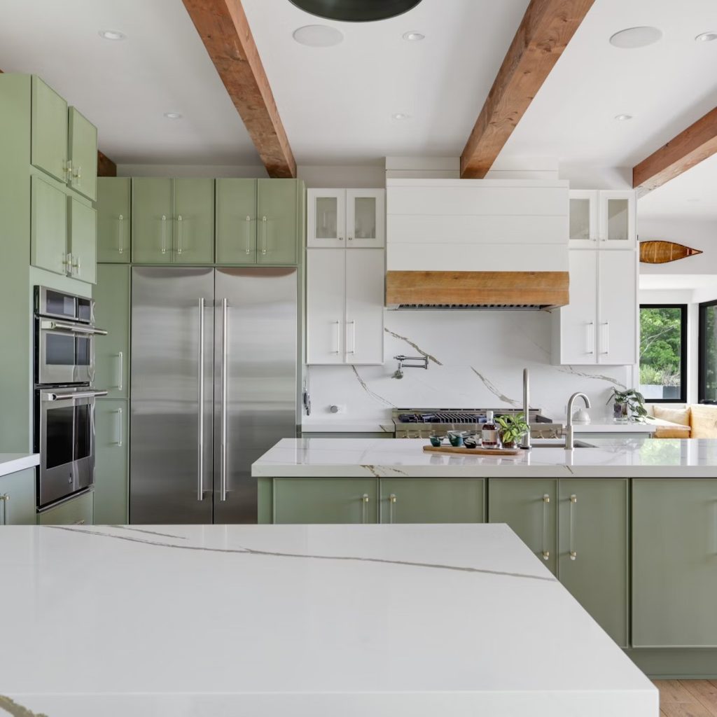 Pastel style with sage green cabinetry. 