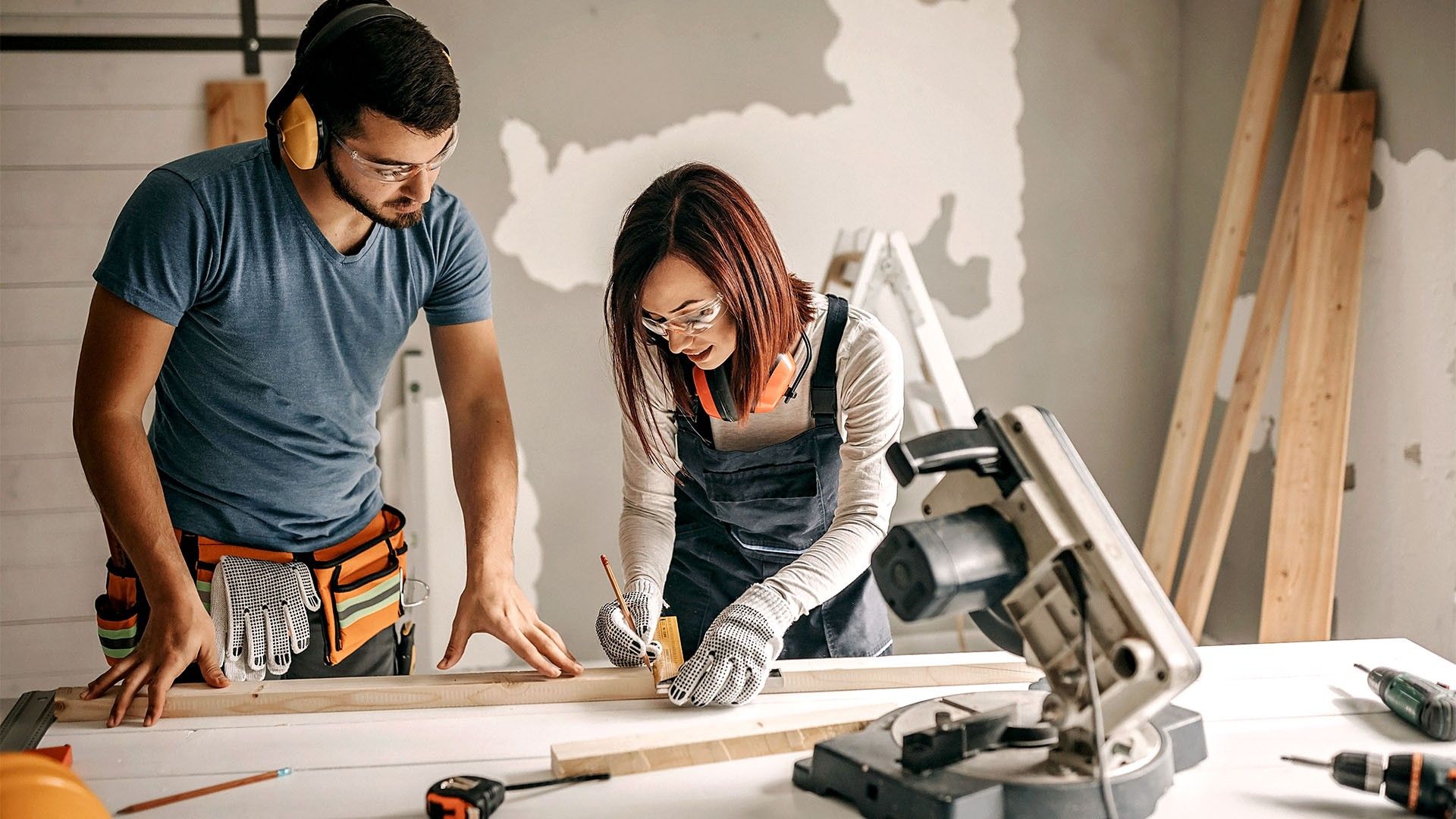 A husband and wife renovating their new home