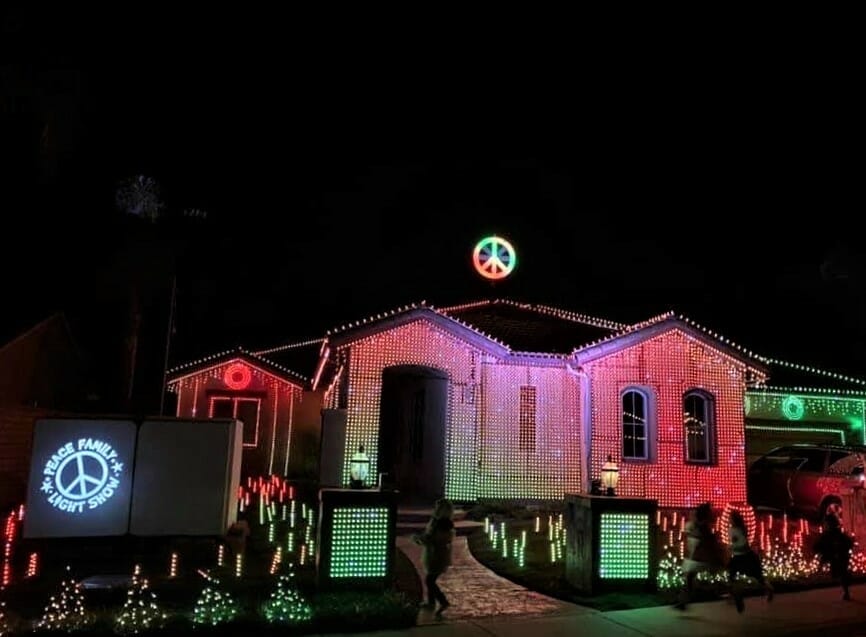 Peace Family House Escondido decorated for Christmas with Peace sign over house