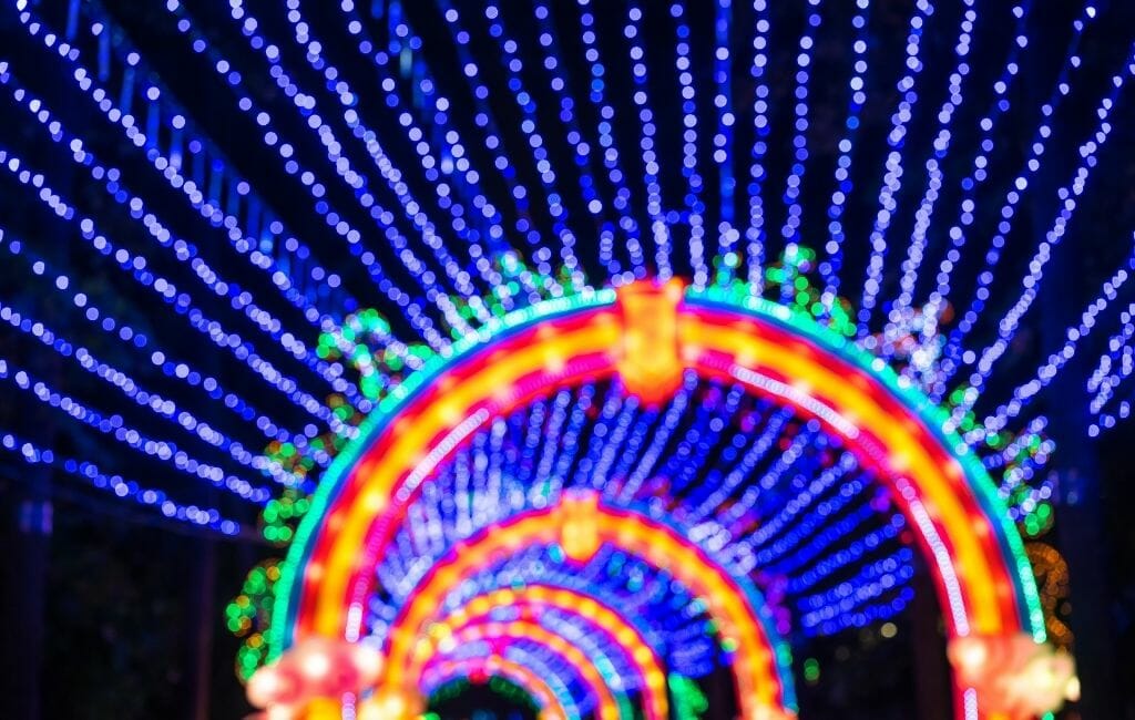 Out of focus photo of christmas lights tunnel