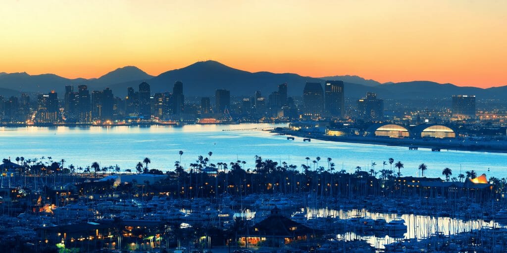 As the sunsets on San Diego, the glow of the water provides a mystic light for sailors and pedestrians around