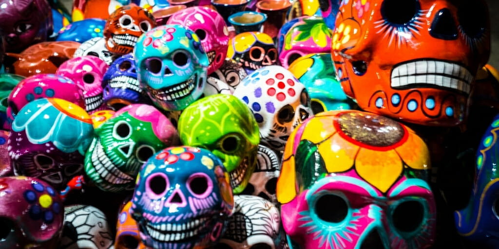 Decorative skulls in various colors decorated as a day of the dead tradition