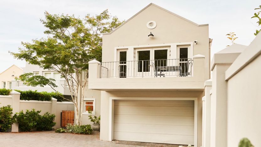 An accessory dwelling unit above a garage connected to a single-family home