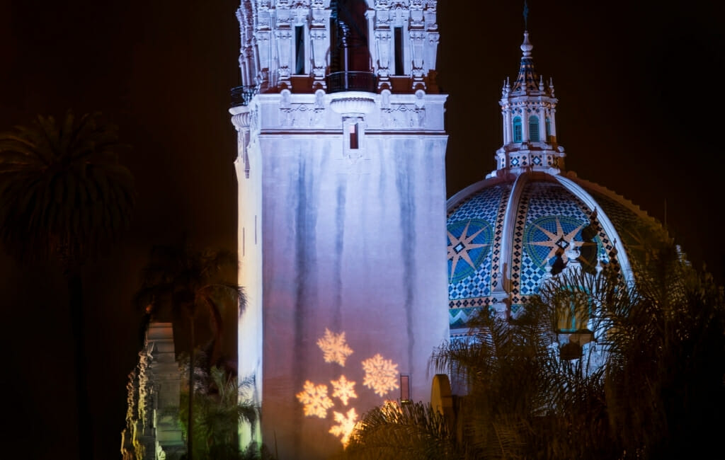 Snow flakes projected on Tower and dome of the Museum of US during San Diego December Nights in Balboa Park