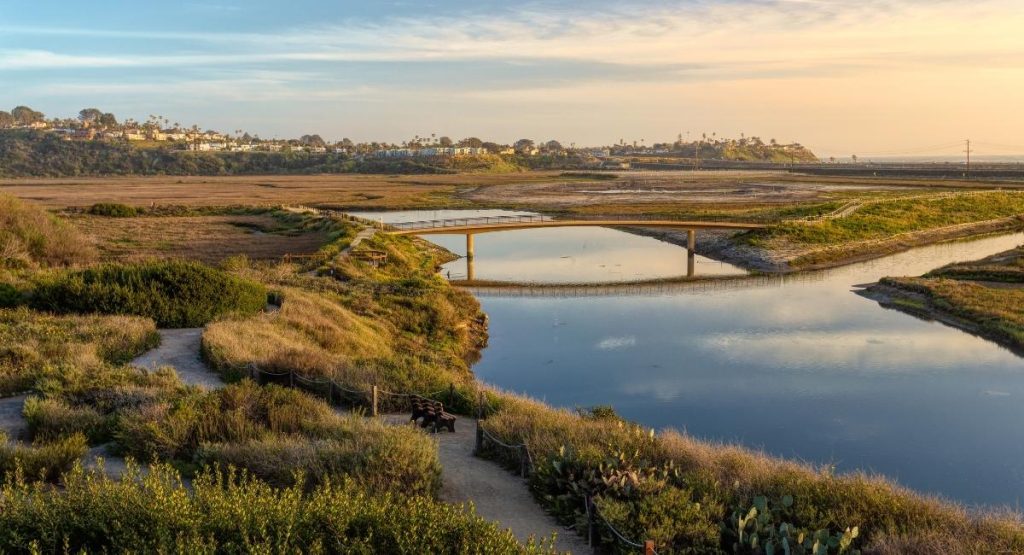 Sunrise over the San Elijo Lagoon Ecological Reserve, a marsh/grassland area with a river near Encinitas