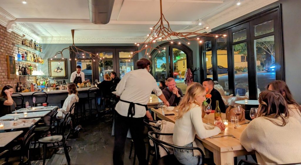 Dining room with people at Black Radish Restaurant in North Park San Diego