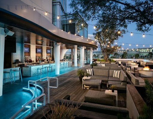 roof top bar at Hard Rock Hotel San Diego Gaslamp with bar and outdoor seating arrangements