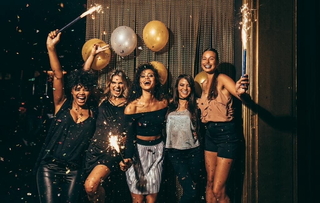 4 women posing for photo on New Years Eve