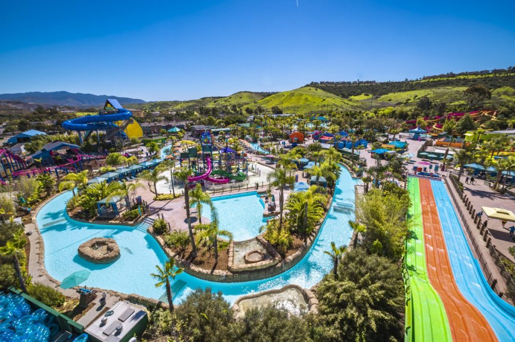 Aerial view of Sesame Place San Diego's lazy river pool and slides