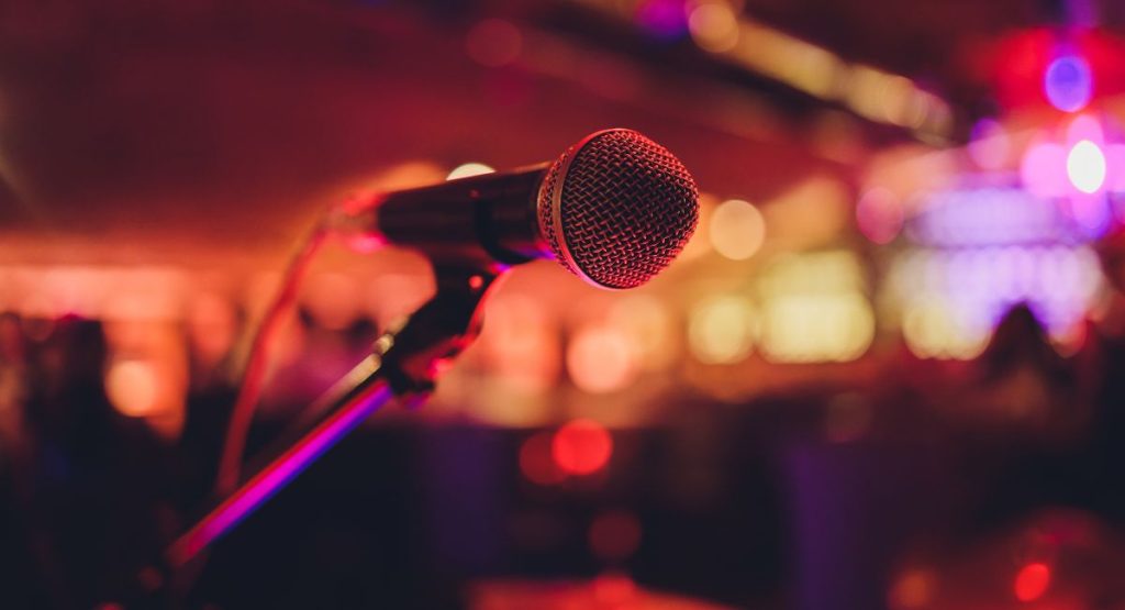 Close up of microphone on stage in bar or restaurant. San Diego Karaoke Bars.