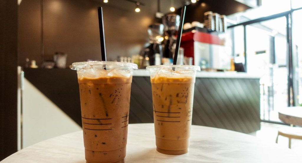 Two iced coffees on table in coffee shop. Best Coffee Shops in San Diego.