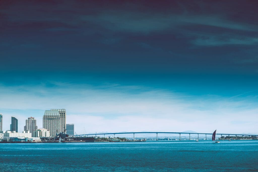 Gloomy sky cast over San Diego with the Coronado bridge connecting it to the island over the water