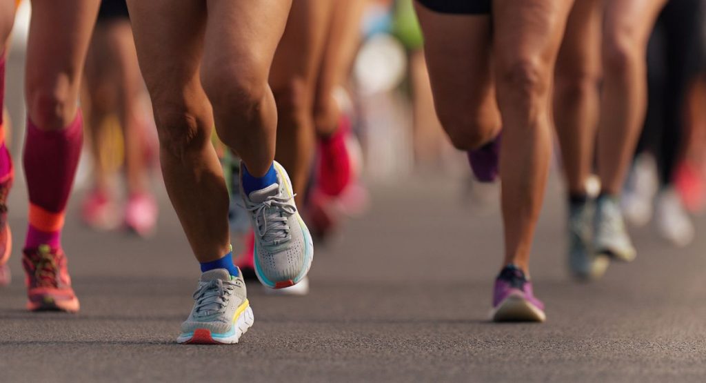 San Diego Half marathon race, close up of legs and feet from the road. San diego half marathons.