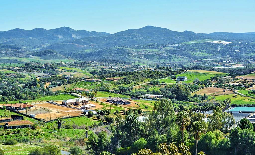 Lush green views over valley from Beach House Winery