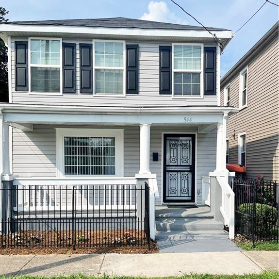 Front of 2 story house located at 944 Pollard Street, Norfolk, Virginia 23504, Doors, windows, sidewalk, fence, vinyl siding, neighboring house, screen door