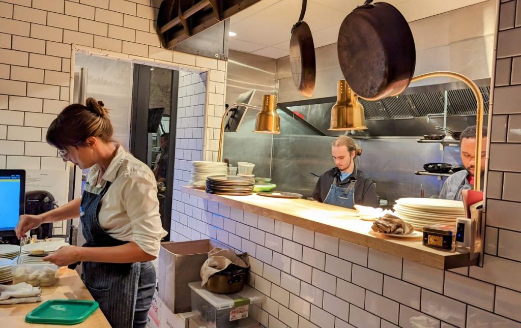 Action shot of Black Radish Open Kitchen