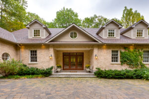 photo of a brown brick house