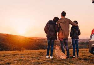 family watching sunset