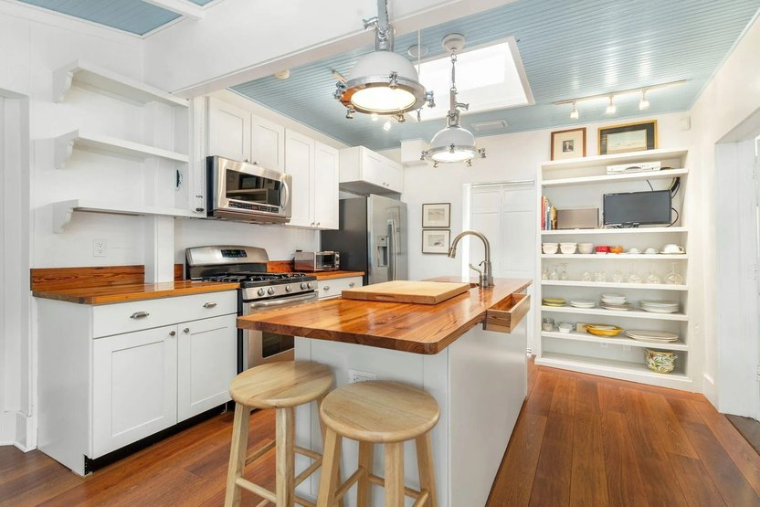 Wood topped island in the kitchen.