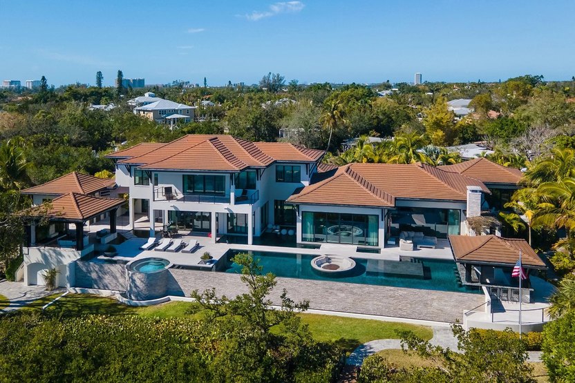 Amenities galore make this $21 million dollar home's backyard one of Florida's best.