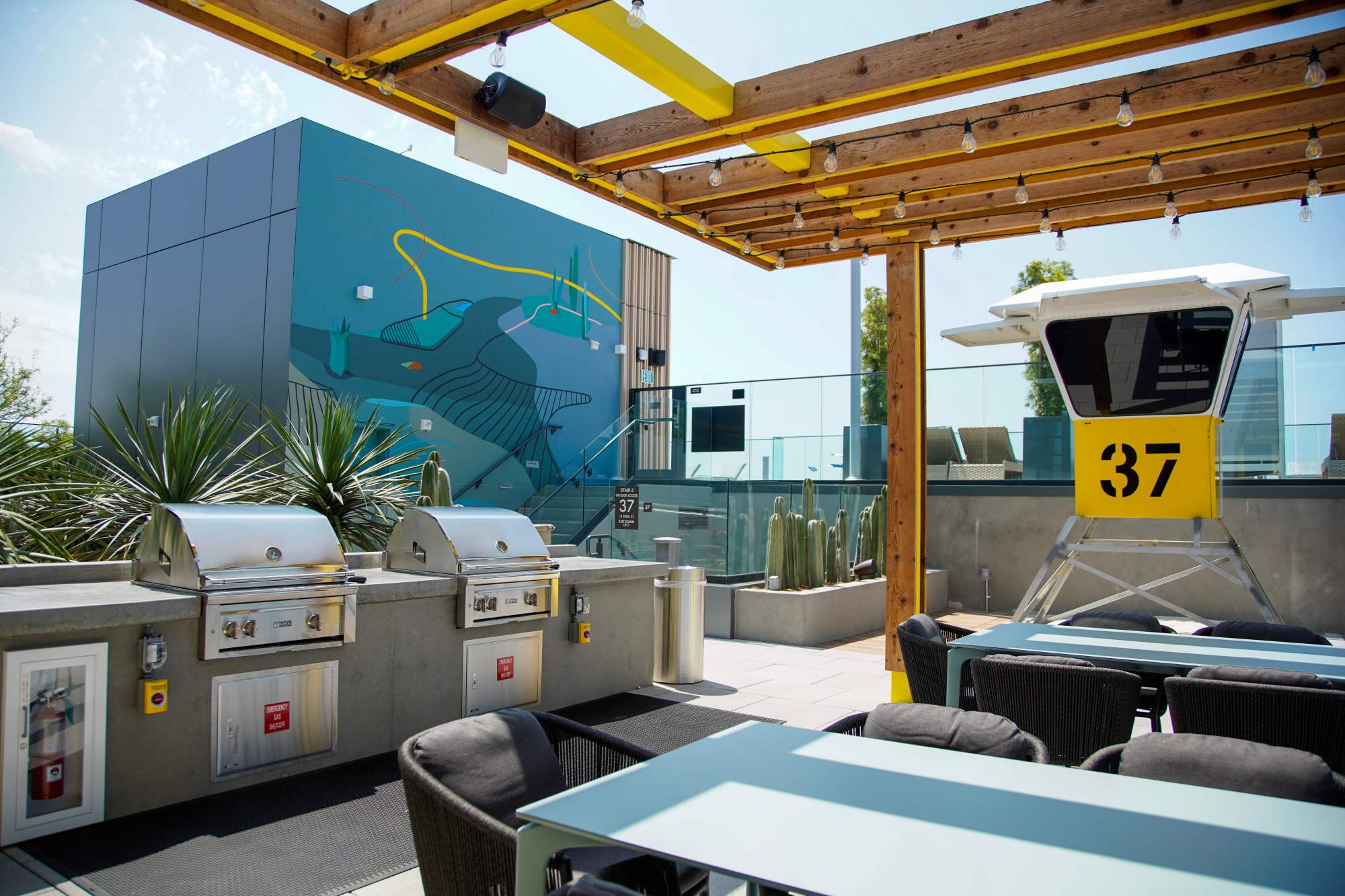 The Sky Lounge cooking area at West offers downtown views and includes a custom-made lifeguard tower. (Alejandro Tamayo / The San Diego Union-Tribune)