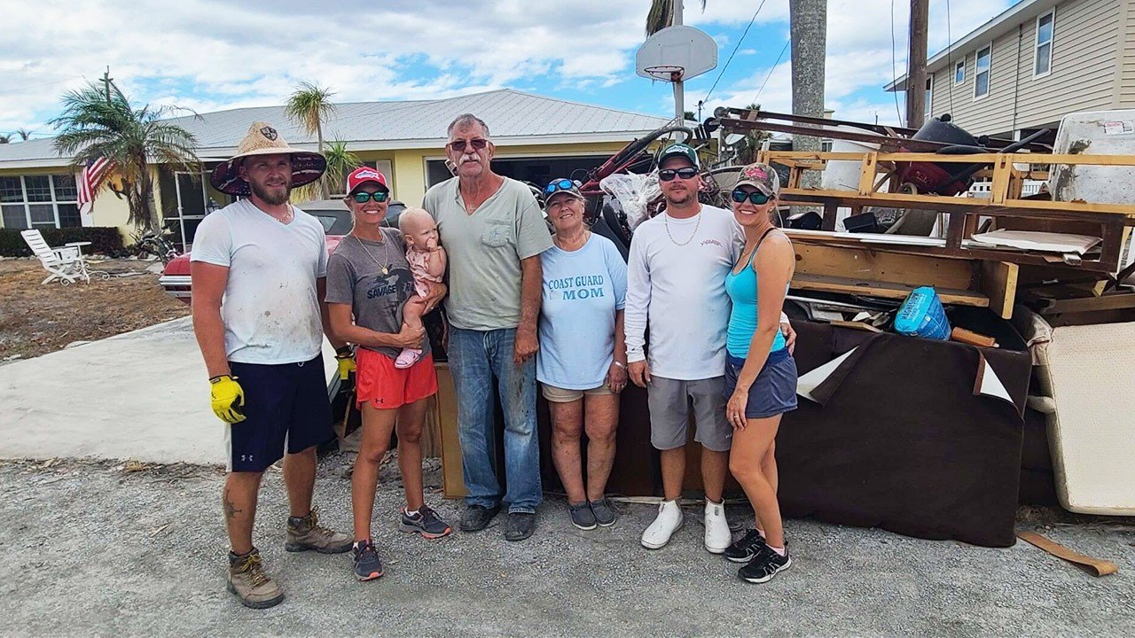 Kory Covaci and her family as they repair her parents home after Hurricane Ian.