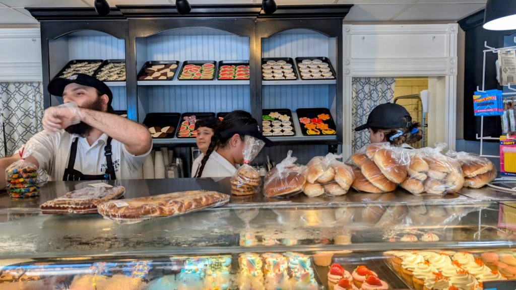 Workers behind the counter at Torrance Bakery